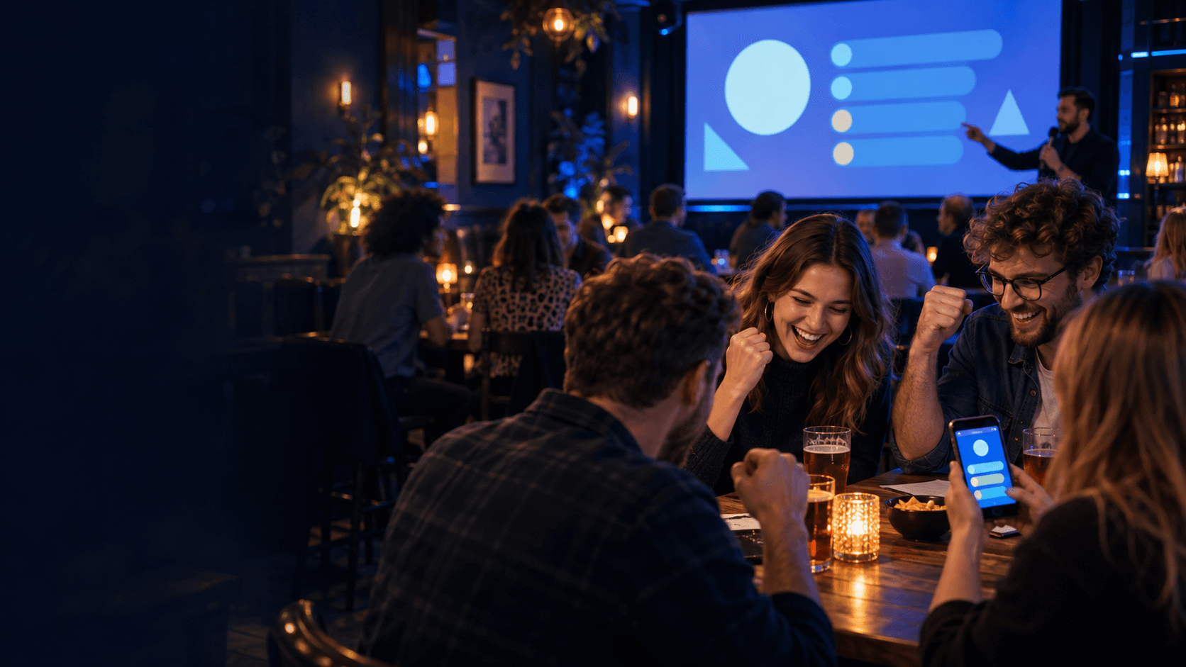 Drużyny grające w pub quiz przy ekranie z pytaniem